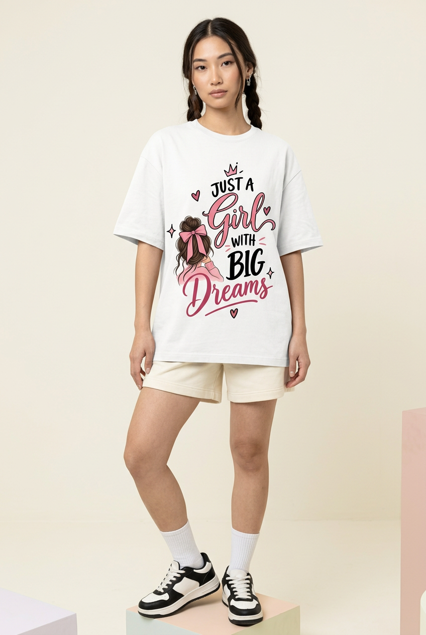 White Big Dreams oversized tee, raised-foot model pose