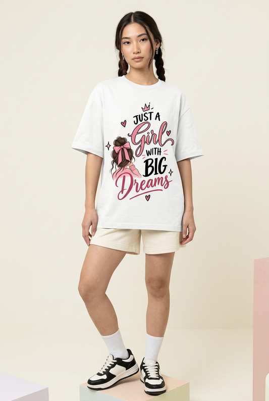 White Big Dreams oversized tee, raised-foot model pose
