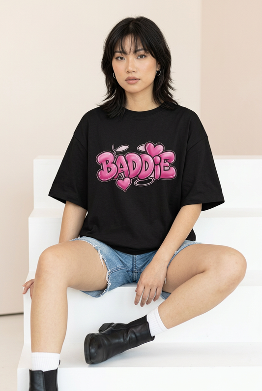 Black Pink Baddie tee with denim shorts, socks and boots