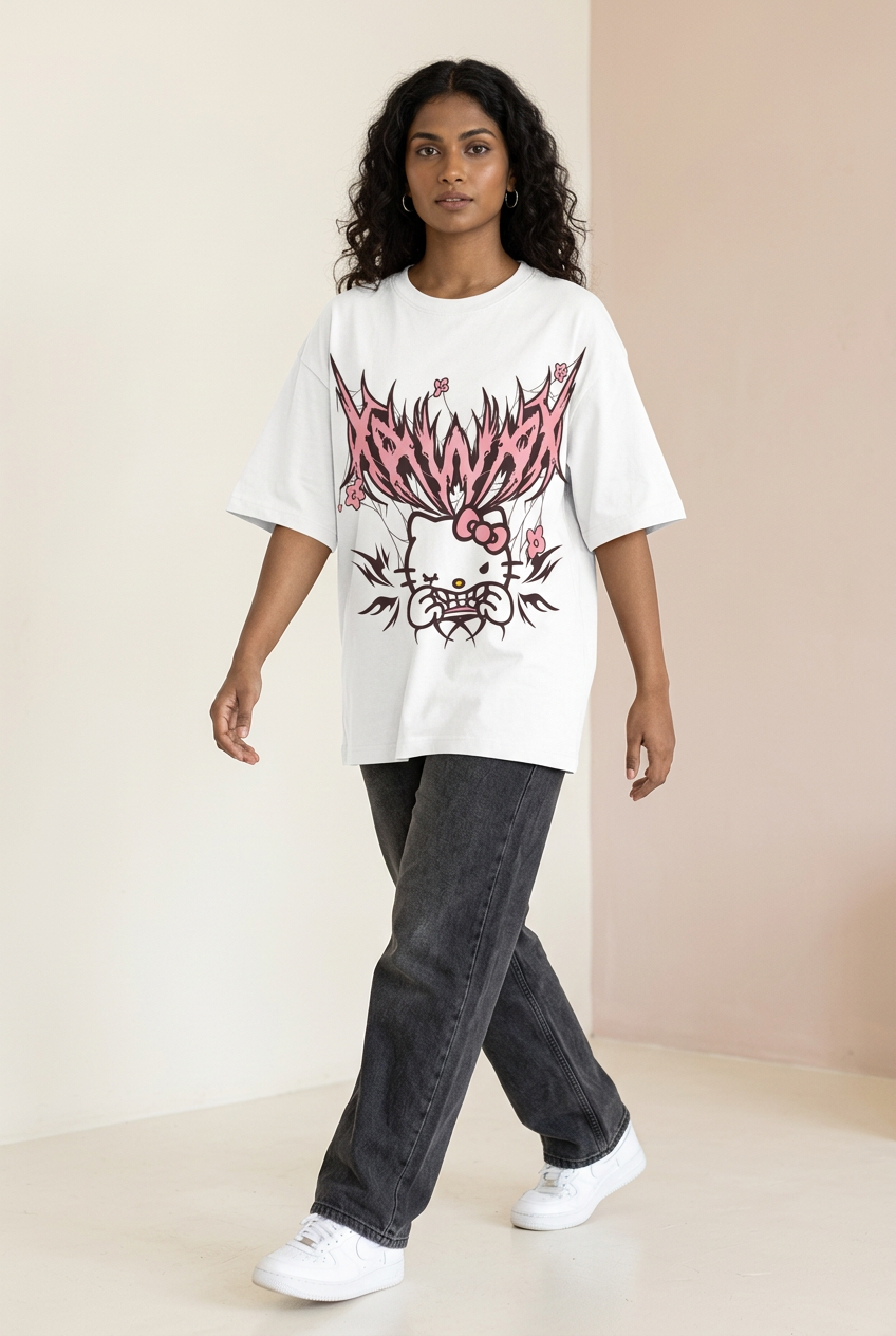 Indian female model in white pink gothic cat tee with charcoal jeans