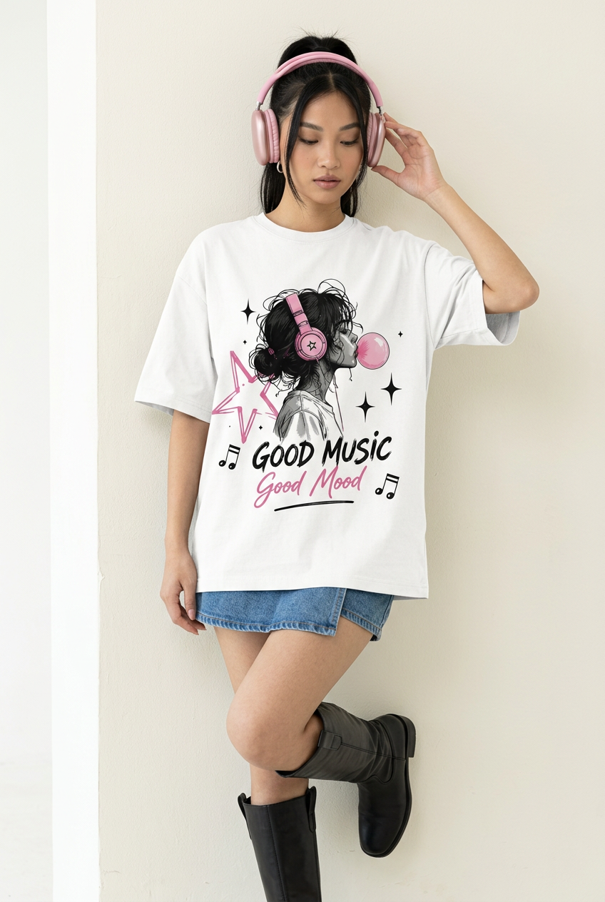 Good Music Good Mood tee with denim skort and tall boots, wall lean