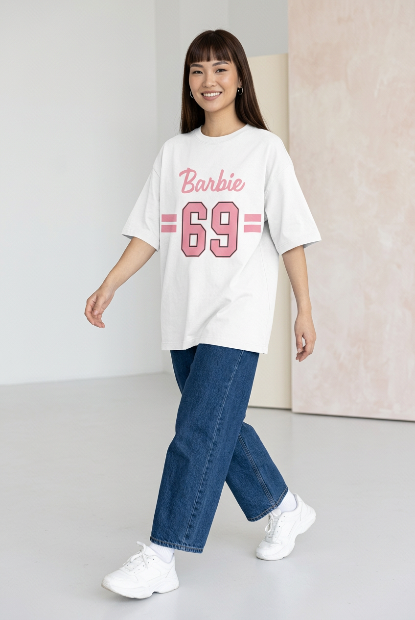 White Pink Barbie 69 oversized tee with loose blue jeans