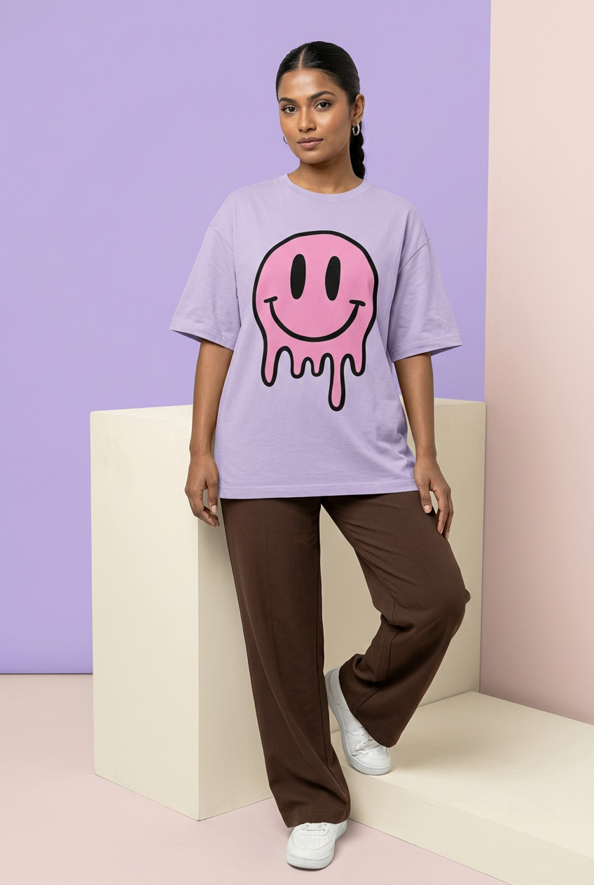Indian female model in lavender smiley tee with brown wide-leg trousers