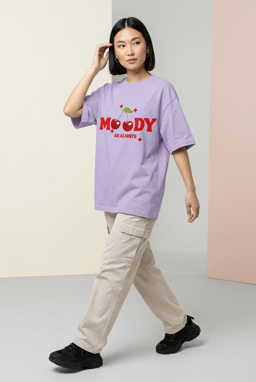 Moody cherry oversized tee with beige cargo pants, walking pose