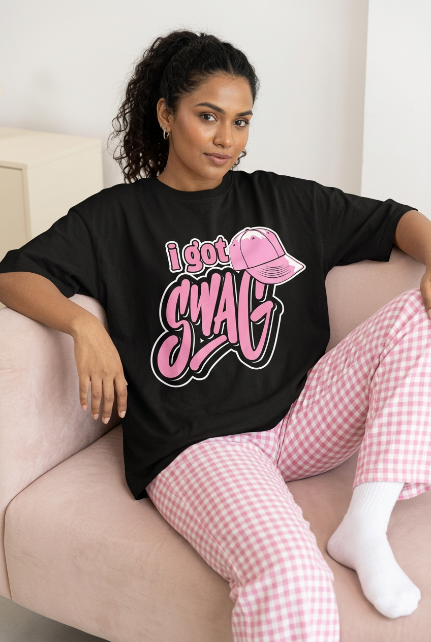 Pink I Got Swag tee with checked pajama pants, sofa pose
