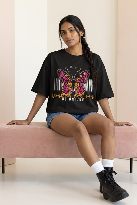 Butterfly oversized tee styled with denim shorts and boots