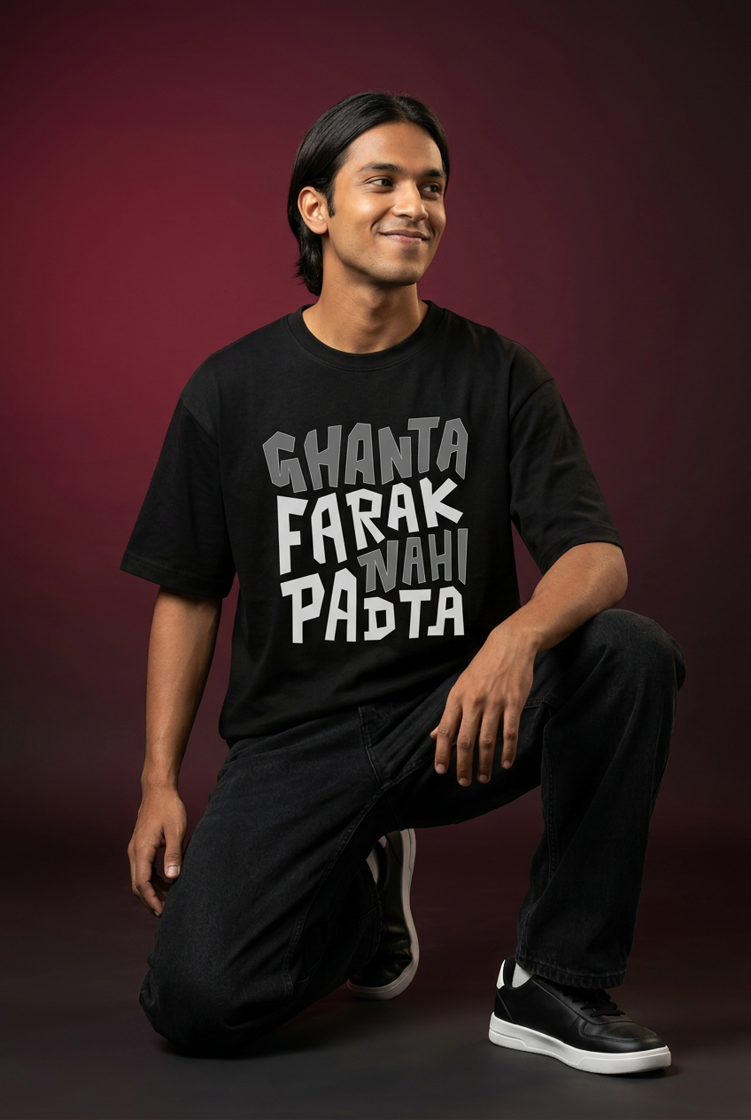 Ghanta Farak oversized T-shirt, Indian Gen Z model, half-kneeling pose