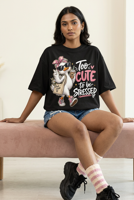 Too Cute duck tee with denim shorts and furry striped socks