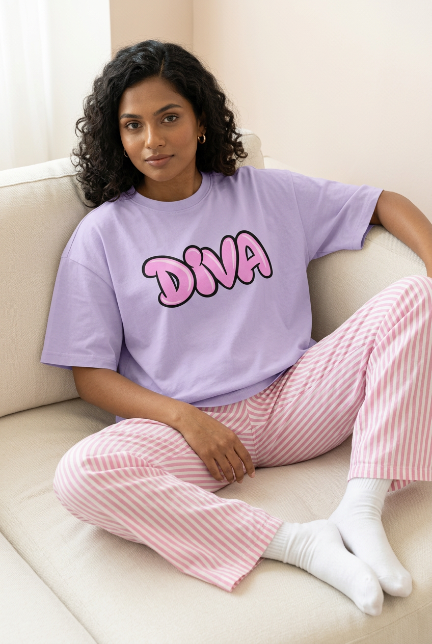 Lavender Pink Diva tee with striped pajama pants, sofa pose