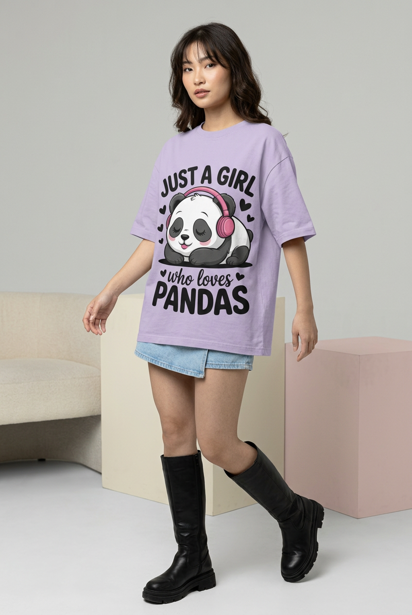 Panda oversized tee styled with denim skort and boots, walking turn